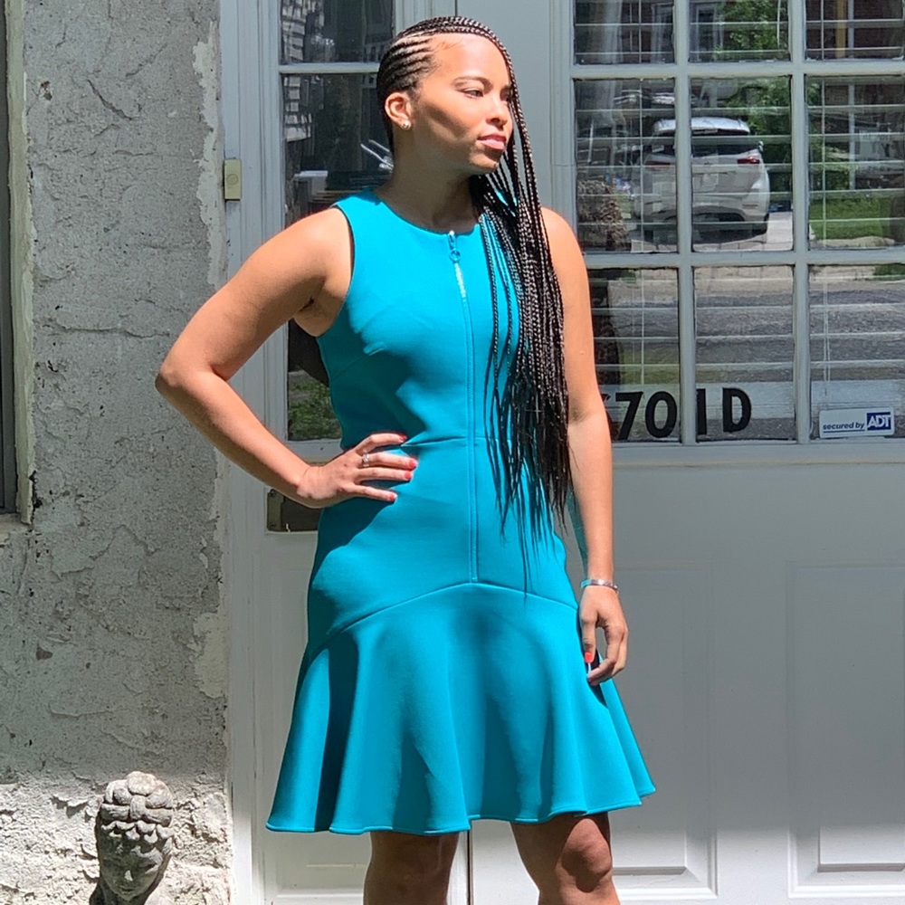 Teal Calvin Klein sleeveless dress.